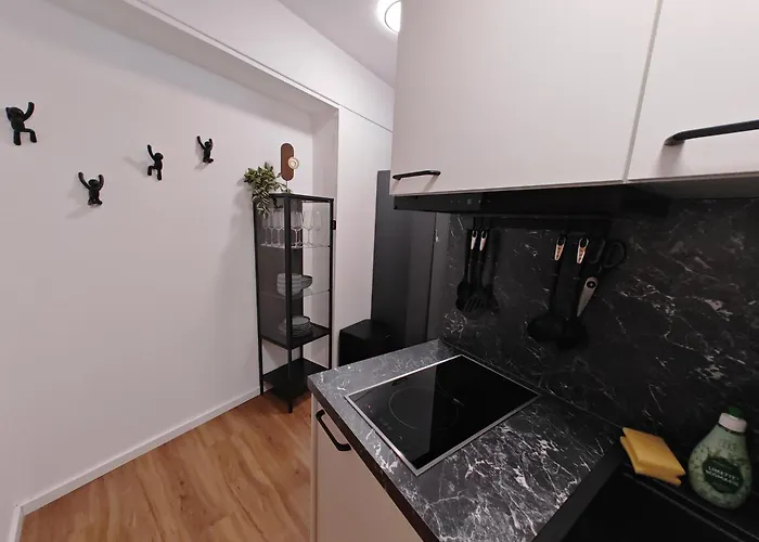 Neu I Design I 1-Zimmer-Apartment I Hotelturm Augsburg I Etage 21 I Boxspring I Ausblick photo